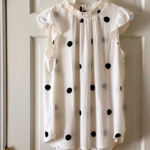 Sheer sleeveless blouse